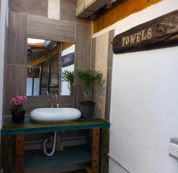 פנסיון Hostal Macondo Inn