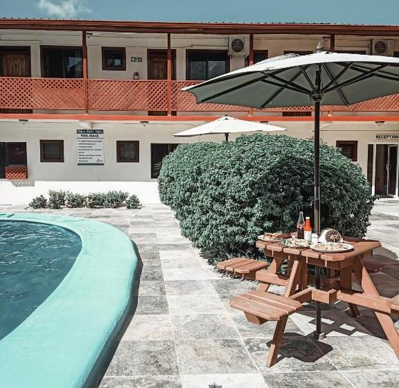 Отель Drift Inn Cayo