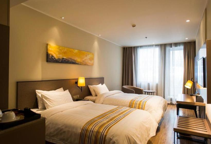 Отель Home Inn Plus Suzhou Wujiang Fenhu Luxin Avenue