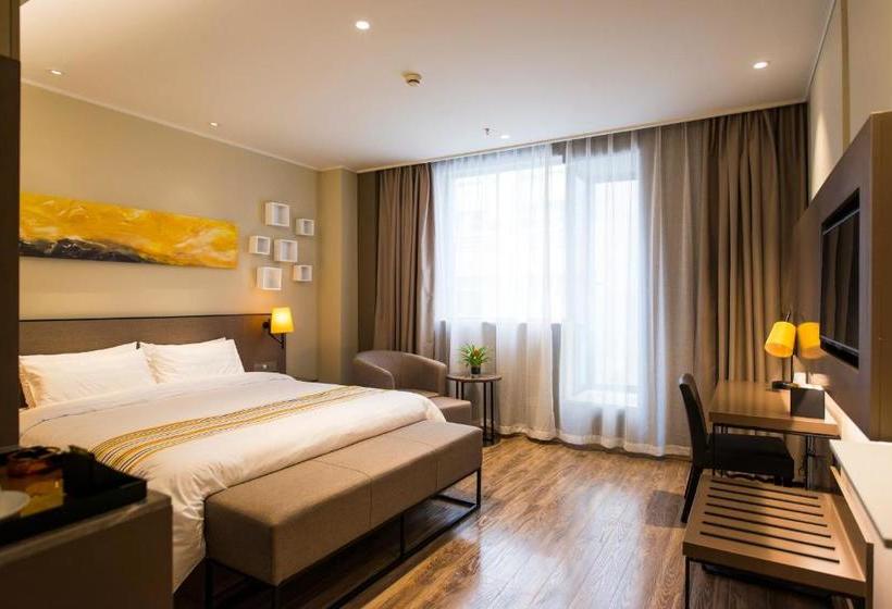 Отель Home Inn Plus Suzhou Wujiang Fenhu Luxin Avenue