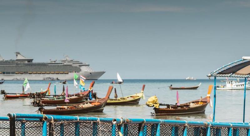 Отель Coconut Village Resort Phuket Sha Extra Plus