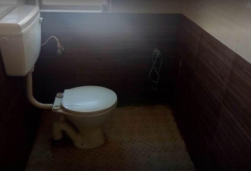 酒店 Krishna Tourist Home