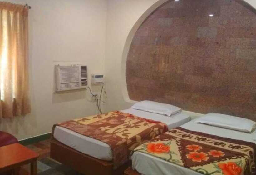 酒店 Krishna Tourist Home