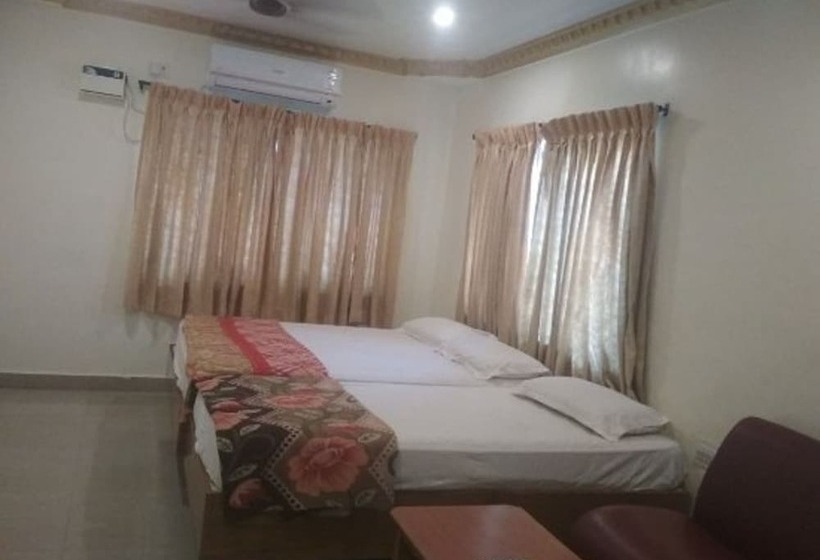 酒店 Krishna Tourist Home