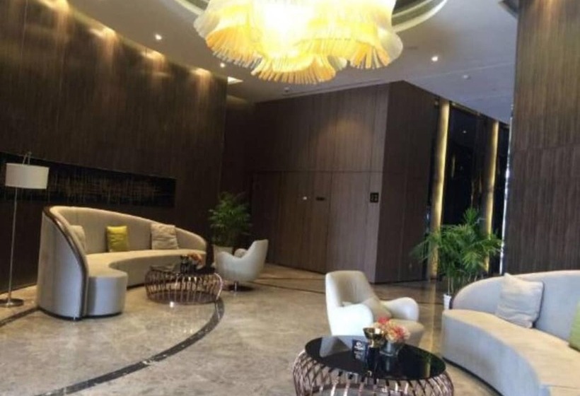 Отель Suzhou Hupan Four Seasons Apartment