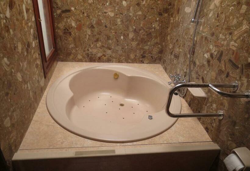 בית מלון כפרי Island Village