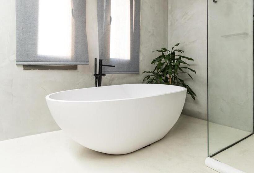 Отель Ostraco Suites