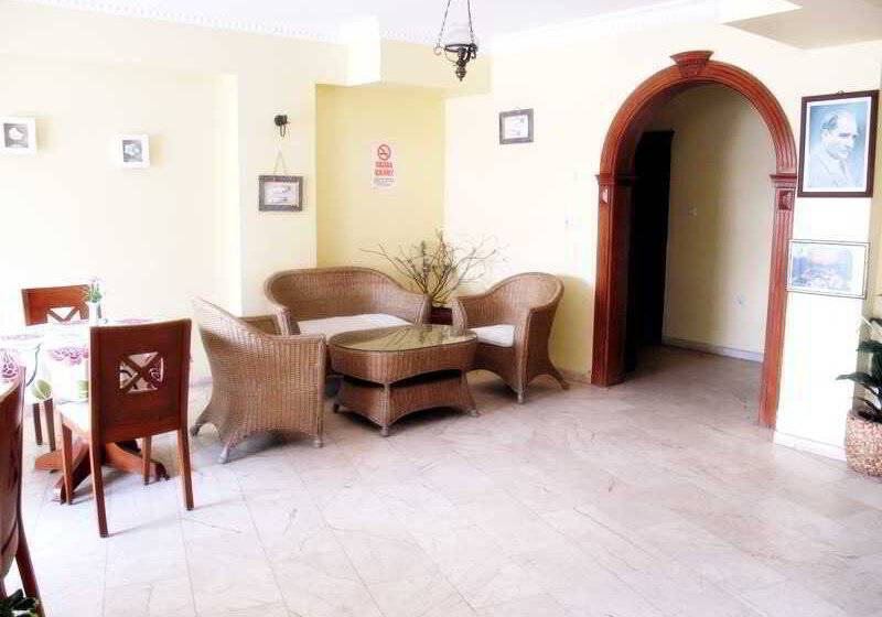 Отель Rosy Suites