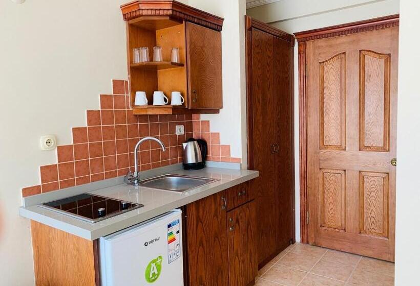 Отель Rosy Suites