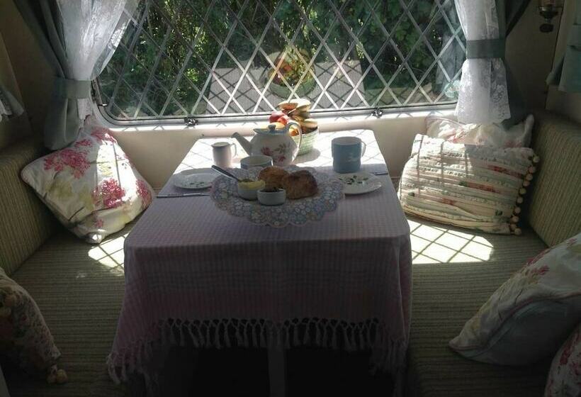 Kitty Unique 60s Caravan Set In Pretty Garden