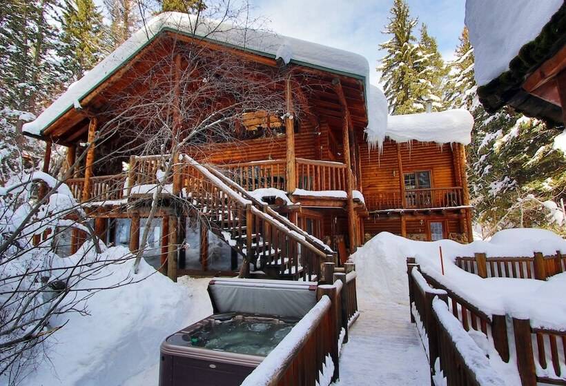 Log Cabin On The Stream