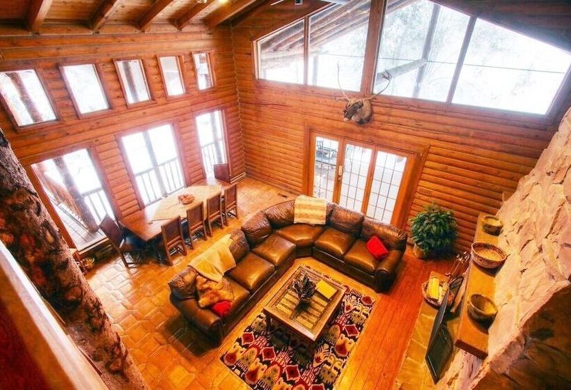 Log Cabin On The Stream