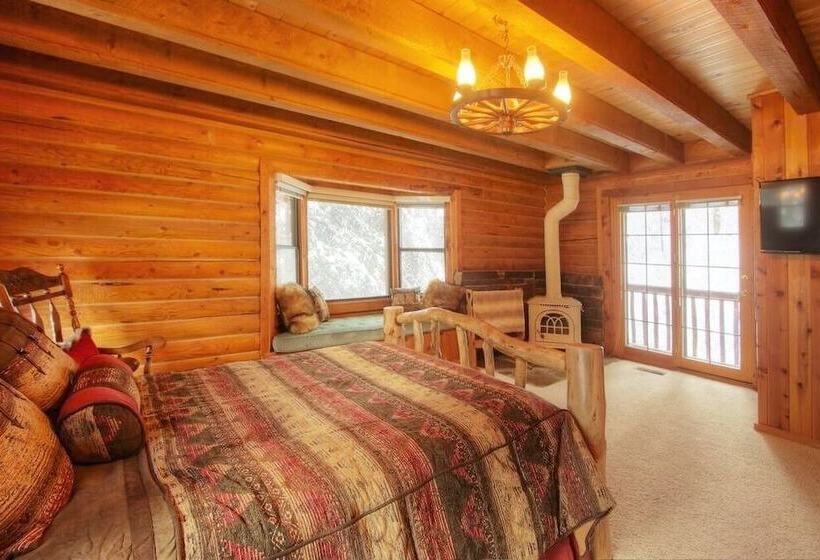 Log Cabin On The Stream