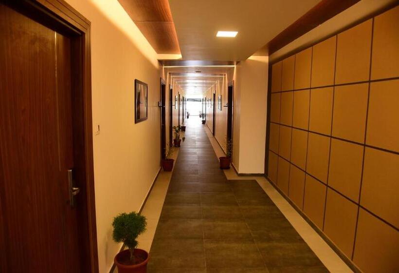 Отель Four N Square Residency