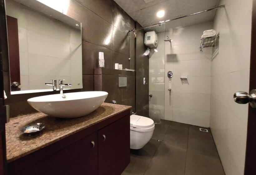 Отель Four N Square Residency