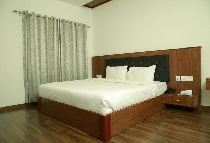 Отель Four N Square Residency