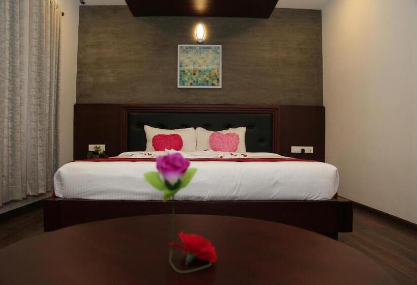 Отель Four N Square Residency