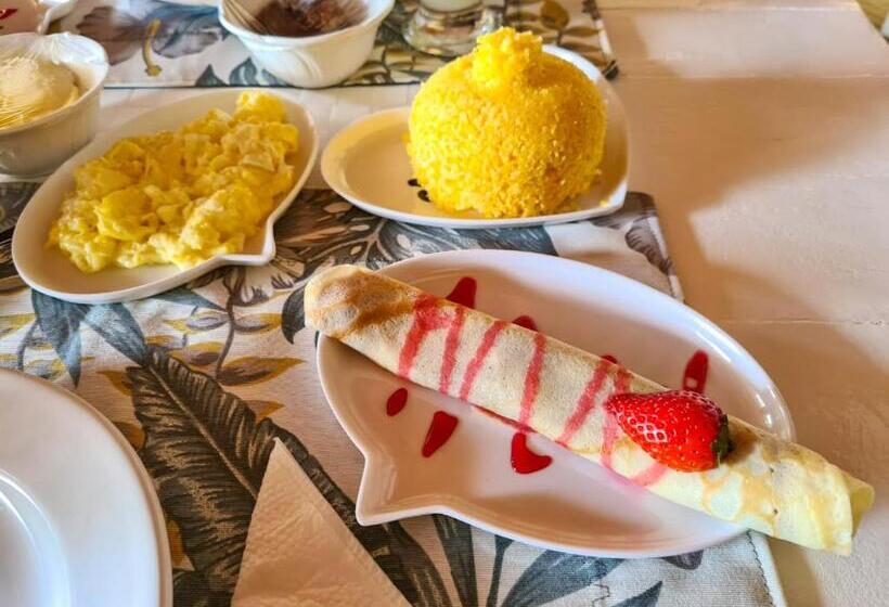 تختخواب و صبحانه Pousada Hibisco