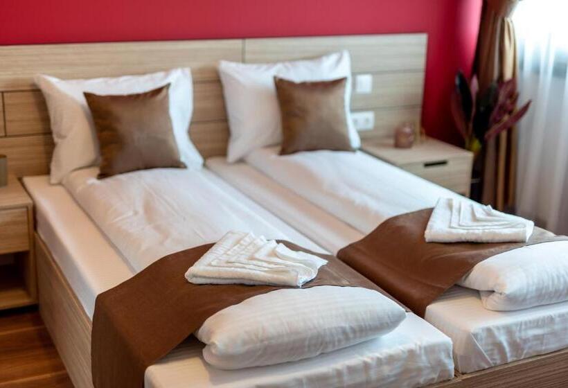 פנסיון Escala Rooms