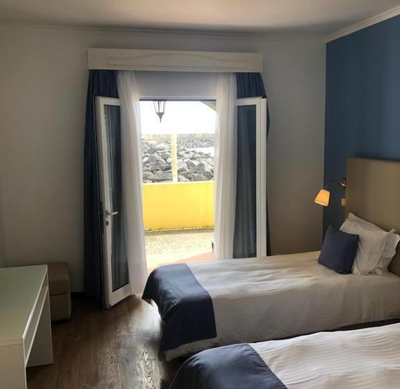 Отель Vinha Da Areia Beach