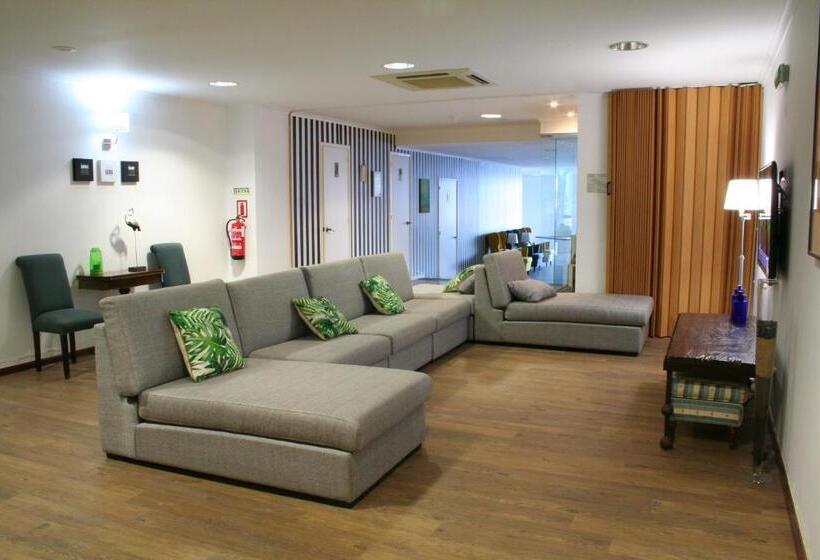 Отель Vinha Da Areia Beach