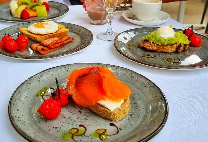 פונדק L Host Boutique Rooms