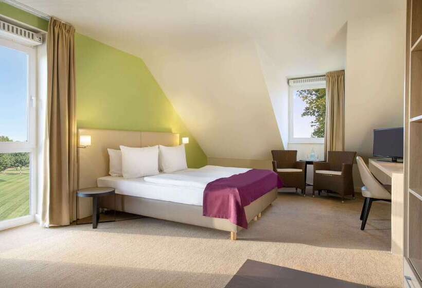 Отель Ramada By Wyndham München Airport