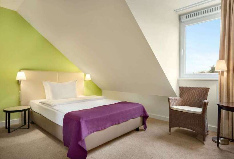 Отель Ramada By Wyndham München Airport