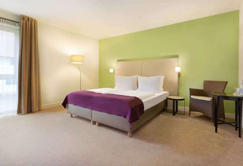 Отель Ramada By Wyndham München Airport