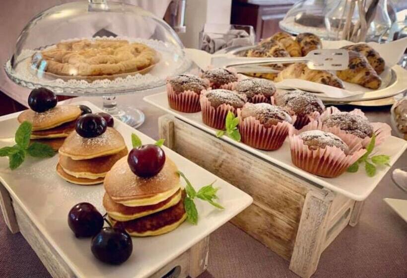 Отель Monti Di Mola