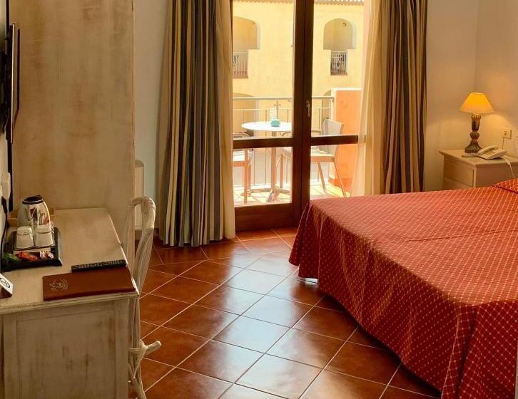 Отель Monti Di Mola