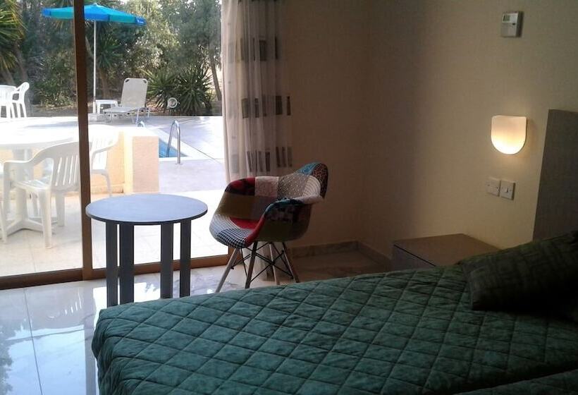 Natura Beach Hotel And Villas