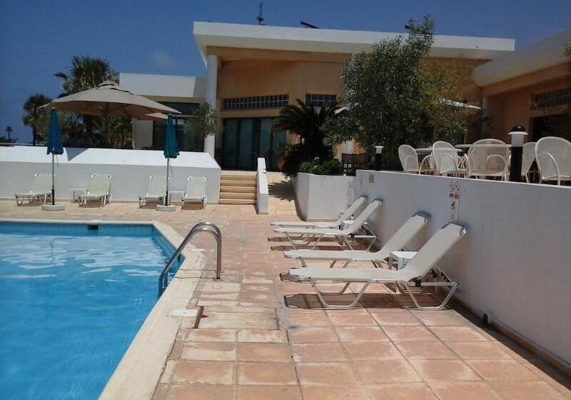 Natura Beach Hotel And Villas