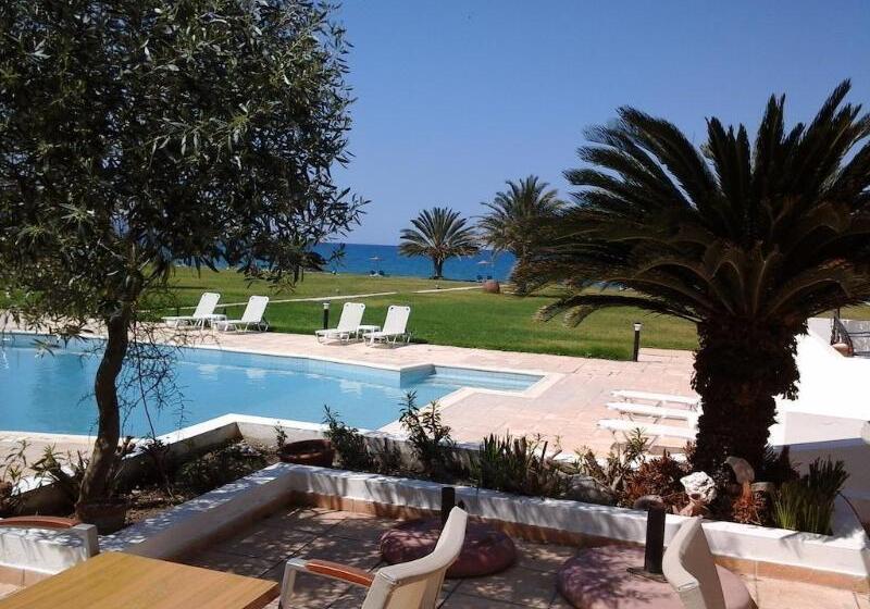 Natura Beach Hotel And Villas