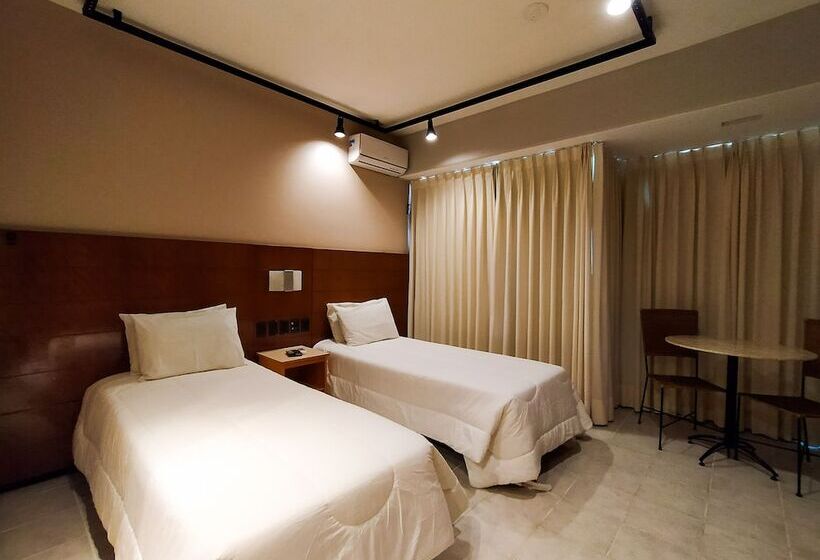 Отель Savassi Village