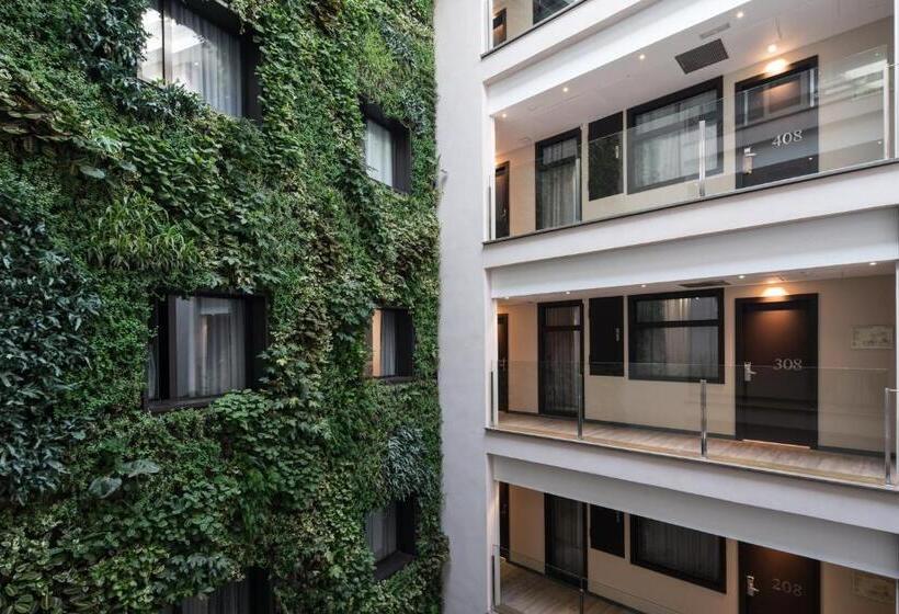 Отель Catalonia Avinyo