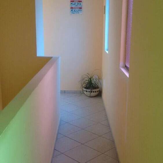 Отель Madero Suites