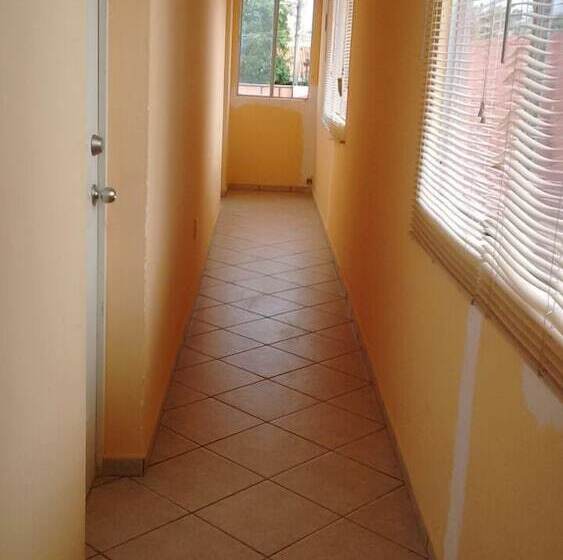 Отель Madero Suites