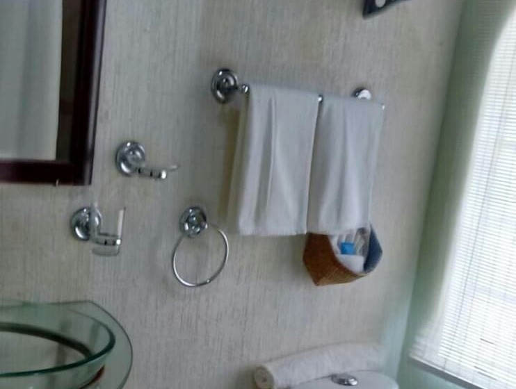 Отель Madero Suites