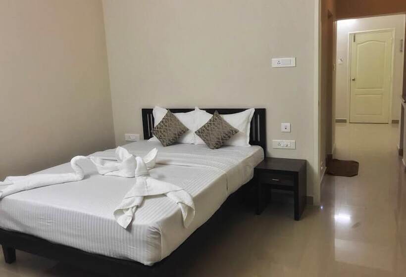 Отель Treebo Aptin