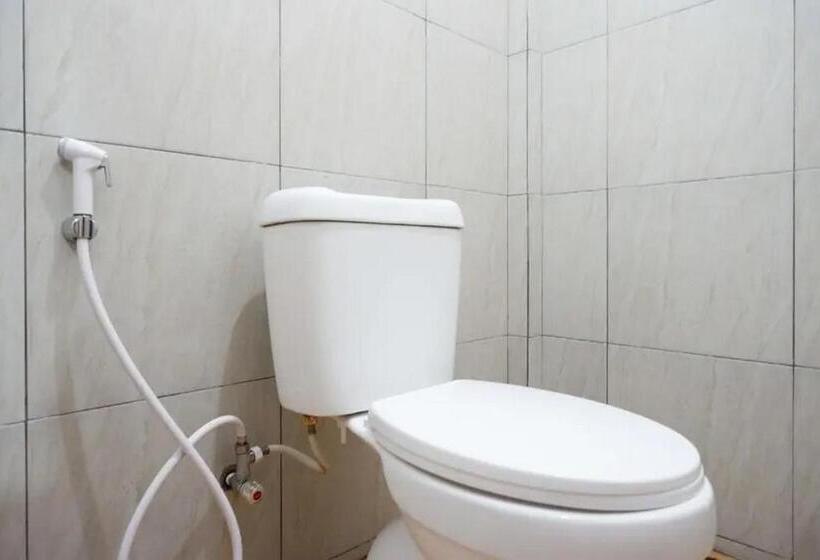 Отель Reddoorz Syariah Near Universitas Jenderal Soedirman 2