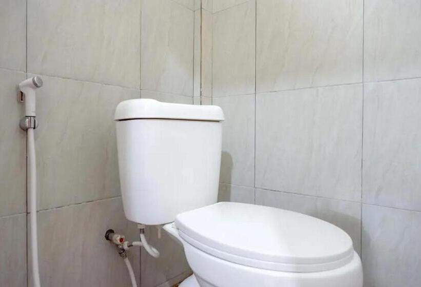 Отель Reddoorz Syariah Near Universitas Jenderal Soedirman 2