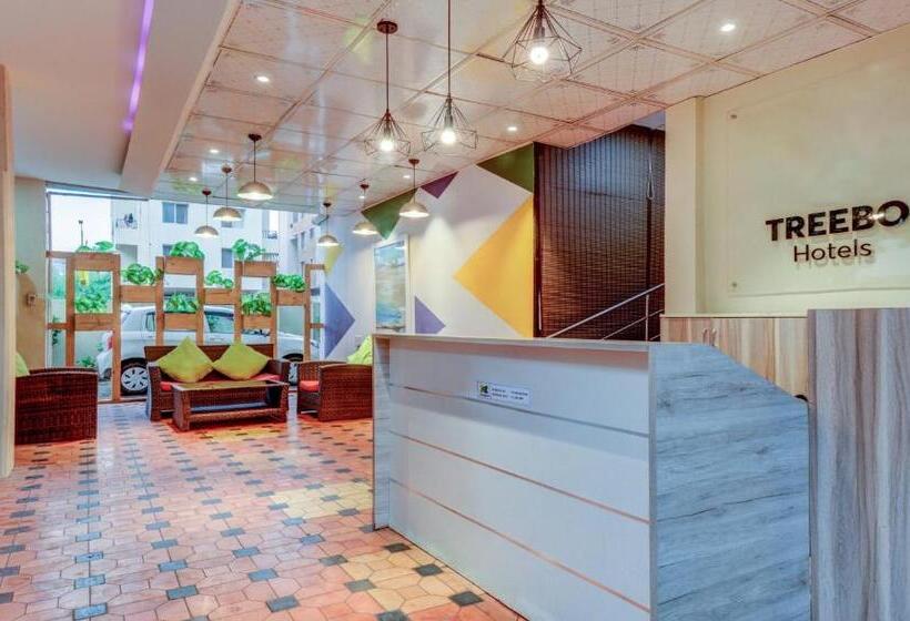 בית מלון כפרי Treebo Iris Suites