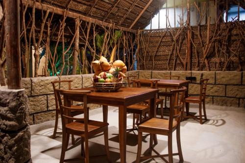 פנסיון Manusath Holiday Inn