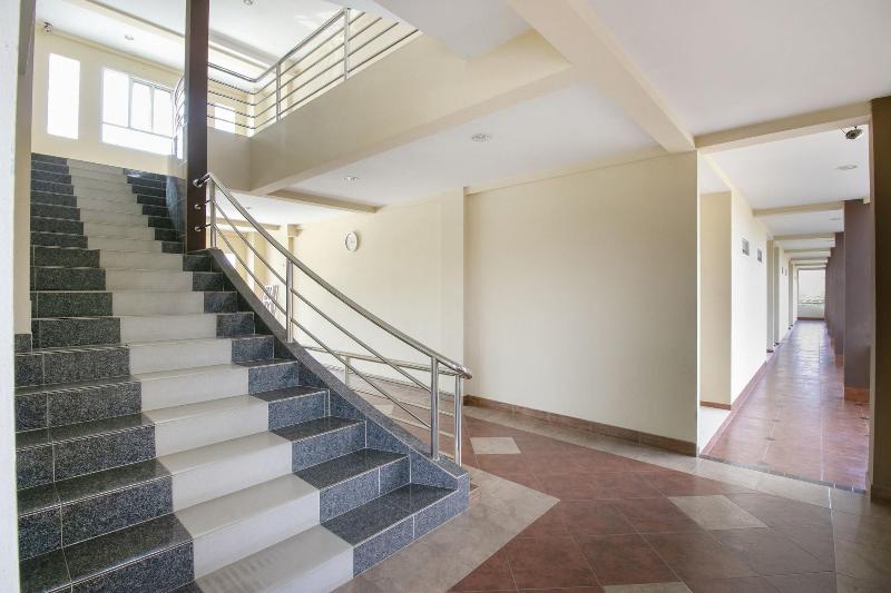 Отель Oyo 75387 4 Men Court