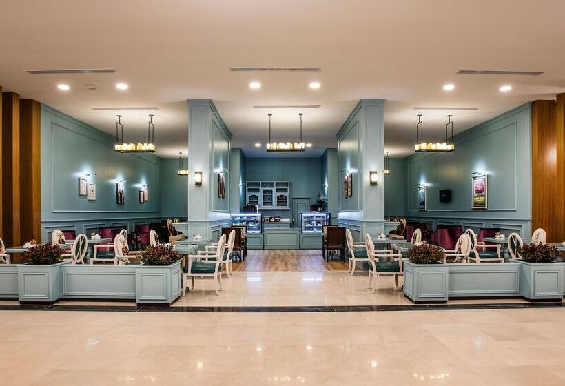 Отель Palm Wings Ephesus Beach Resort