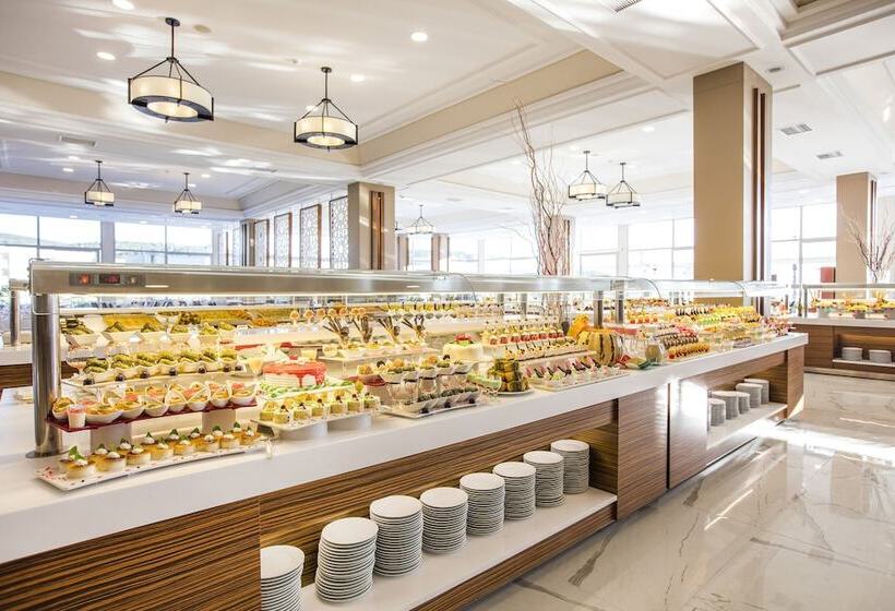 Отель Palm Wings Ephesus Beach Resort