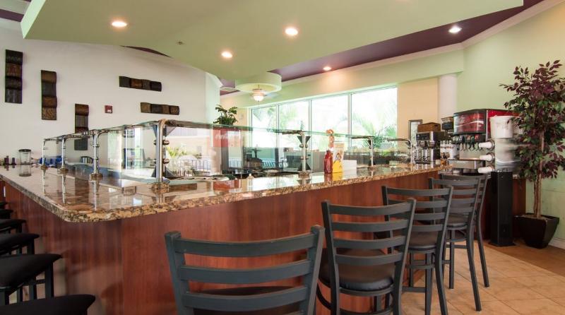 Отель Sunset Vistas Two Bedroom Beachfront Suites