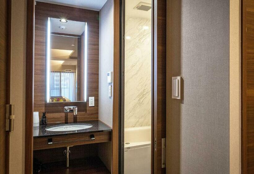 Отель かりゆしコンドミニアムリゾート那覇 グランステイ旭橋駅前