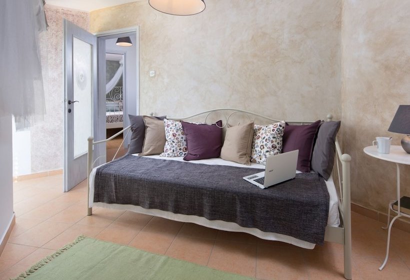 Surrounded By Beautiful Mediterranean Vegetation And The Crystal Clear Sea